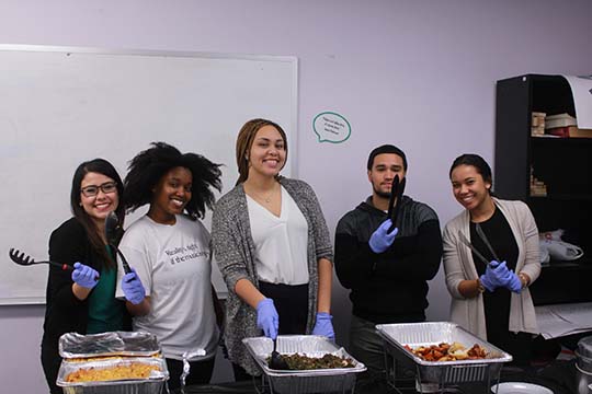 HEAF volunteers serving food